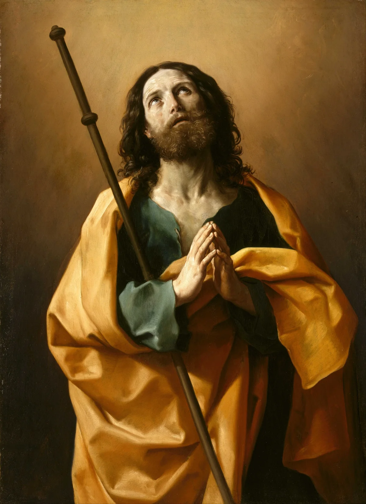 St. James the Apostle holding a pilgrim’s staff and looking heavenward.